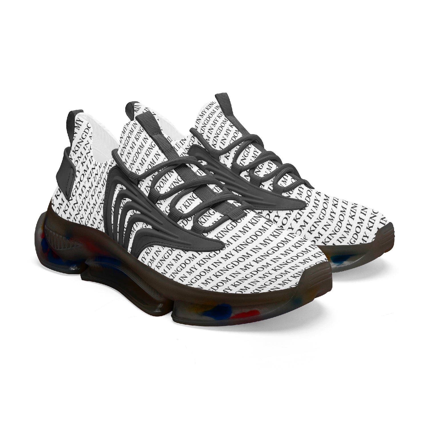 “In My Kingdom unisex performance runners featuring an all-over ‘IN MY KINGDOM’ monogram, sculpted futuristic midsole with coloured cushioning pods, wing-shaped side panels, and breathable mesh upper. Shown in both a white translucent sole version and a black translucent sole version.”