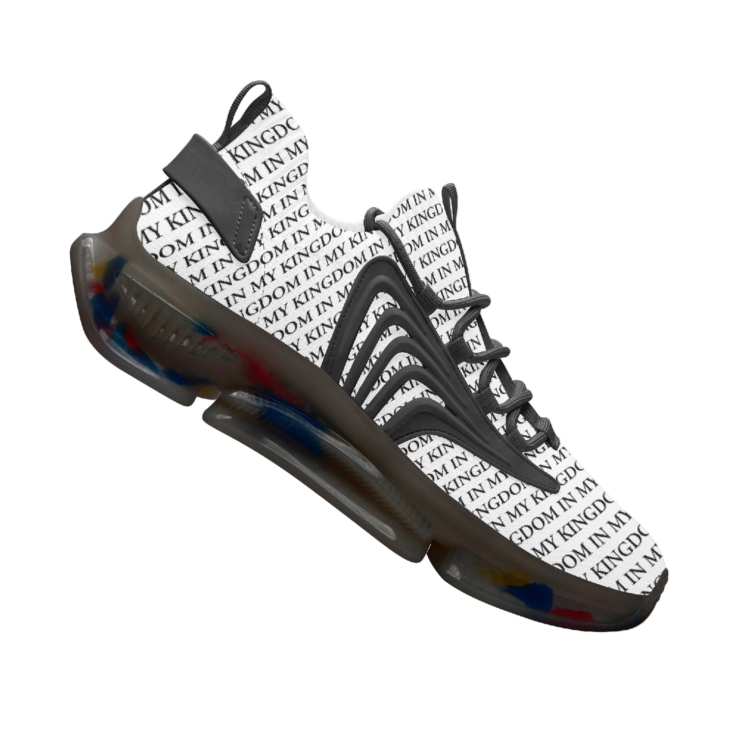 “In My Kingdom unisex performance runners featuring an all-over ‘IN MY KINGDOM’ monogram, sculpted futuristic midsole with coloured cushioning pods, wing-shaped side panels, and breathable mesh upper. Shown in both a white translucent sole version and a black translucent sole version.”